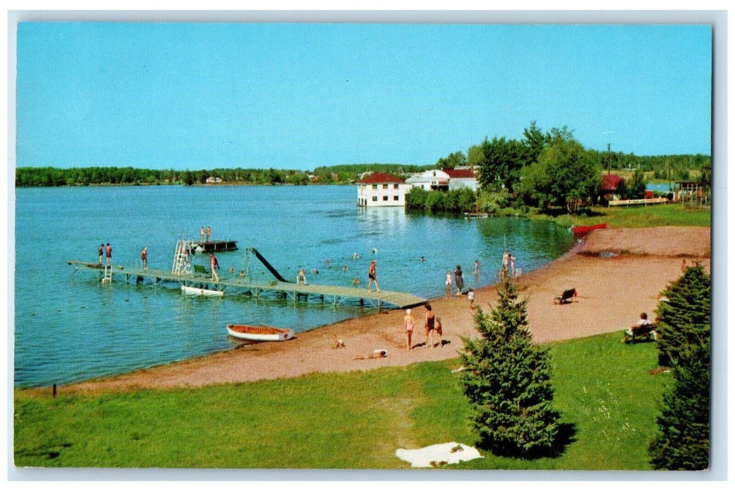 c1960 Bathing Beach Pier Dock Canoe Boat Swimsuit Minocqua Wisconsin WI Postcard