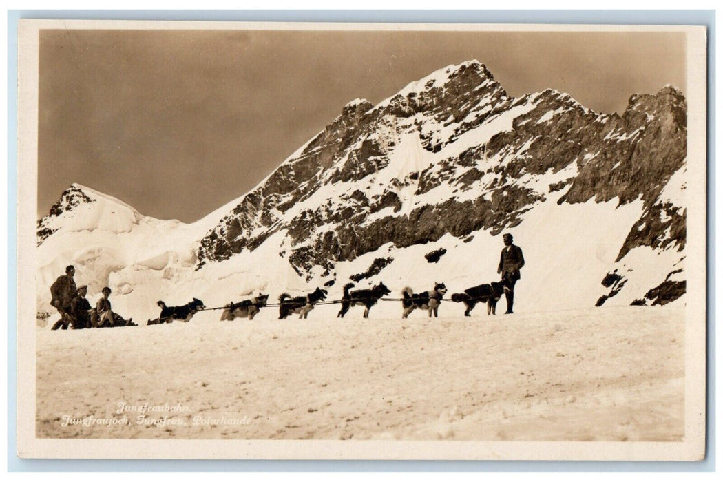 c1930's Jung Fraubaun Switzerland Dog Sled Team Winter Snow RPPC Photo Postcard