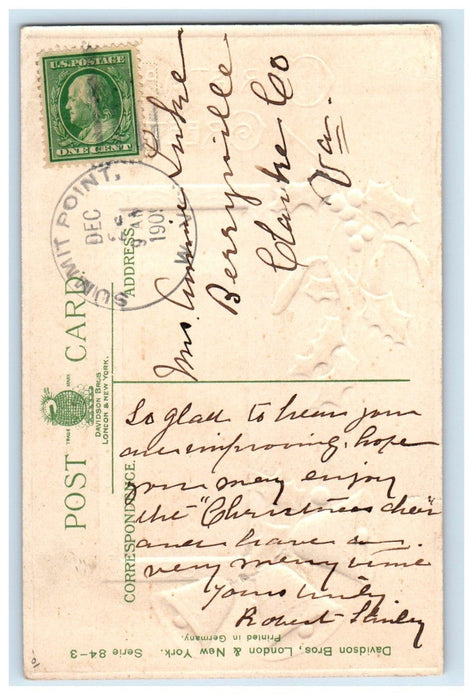 1909 Christmas Greetings Holly Bells Winter Snow Hut Embossed Antique Postcard