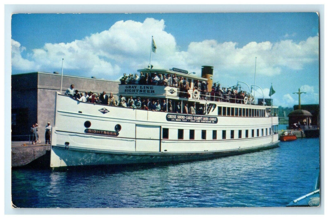 c1950's Gray Line Sightseer Passing U.S Government Locks Steamer Ship Postcard