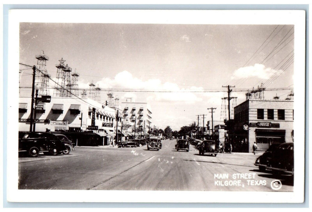 Main Street Coca Cola Drugs Store Cars Kilgore Texas TX RPPC Photo Postcard