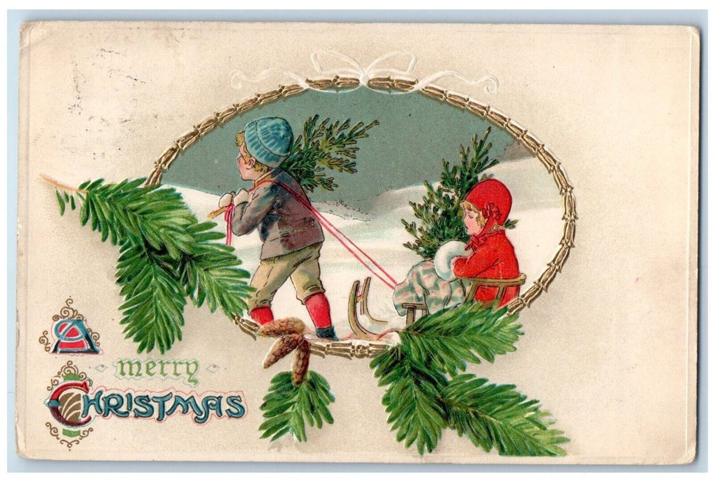 1911 Merry Christmas Boy Pulling Cart Girl Handwarmer Pine Cone Posted Postcard