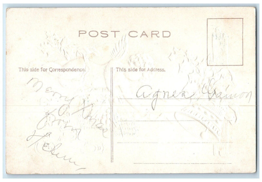 c1910's Merry Christmas Angel Ringing Bell Holly Berries Embossed Postcard