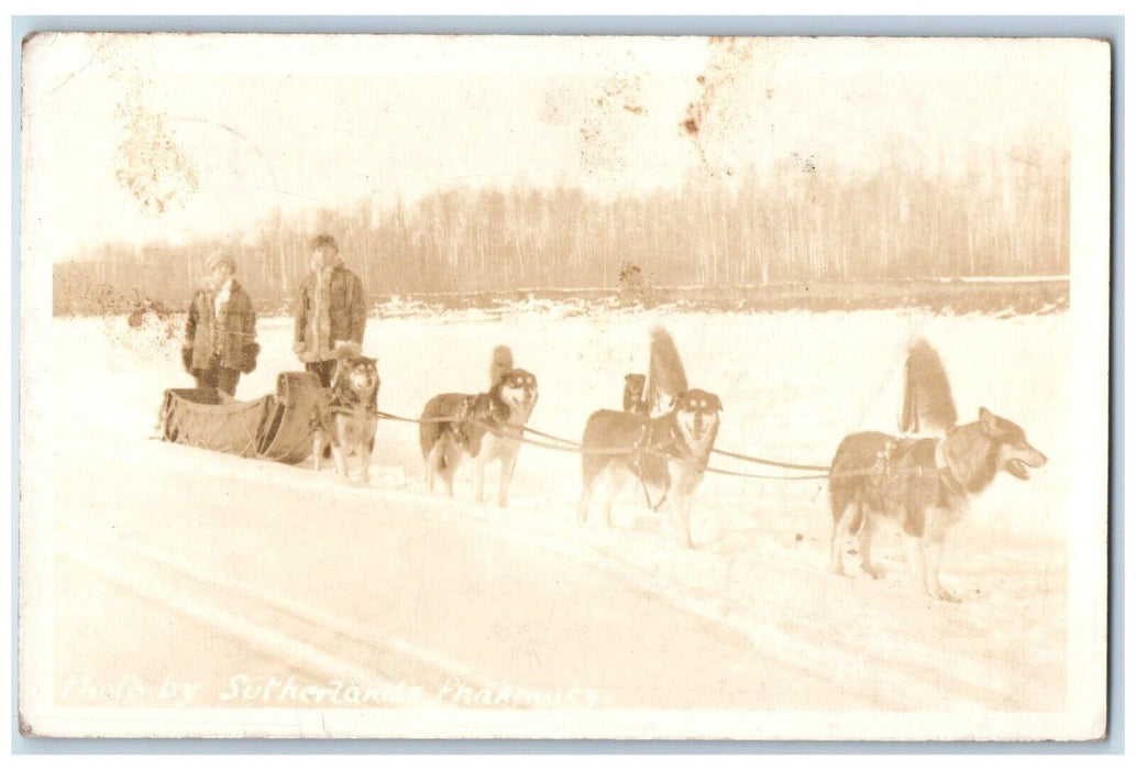 1942 Dog Sled Team Toboggan Fort McMurray Alberta Canada RPPC Photo Postcard
