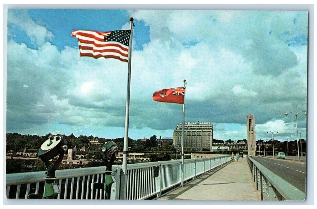 c1950's Entering Canada Rainbow Bridge Flags Niagara Falls Canada Postcard