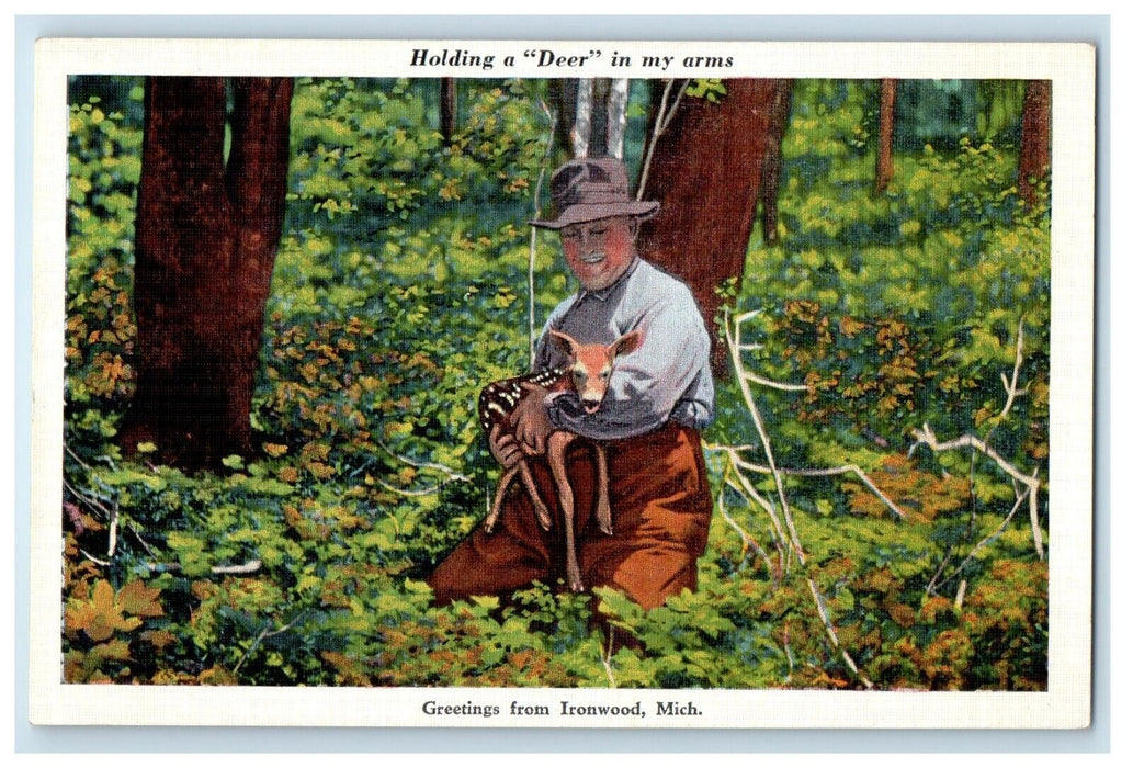 c1930's Greetings From Ironwood Michigan MI, Man Holding A Deer Vintage Postcard