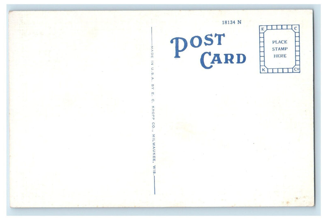 c1930's Greetings From Ironwood Michigan MI, Man Holding A Deer Vintage Postcard