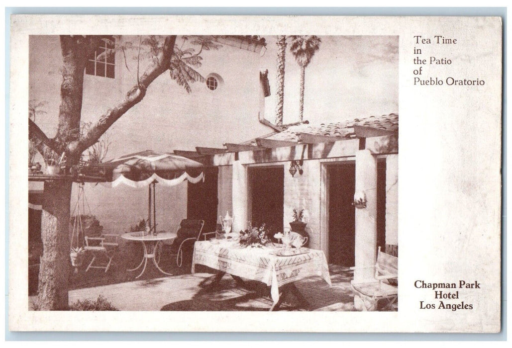 Tea Time In Patio Pueblo Of Oratorio Chapman Park Hotel Los Angeles CA Postcard