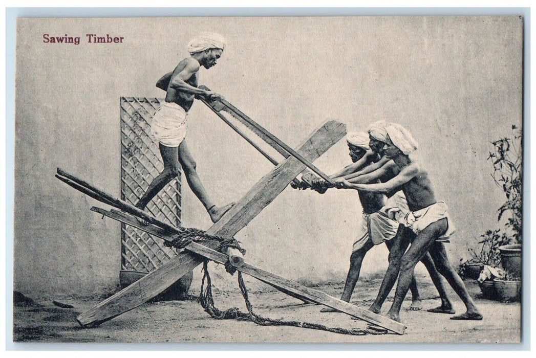 c1910's Tribal Men Sawing Timber Logs India Unposted Antique Postcard