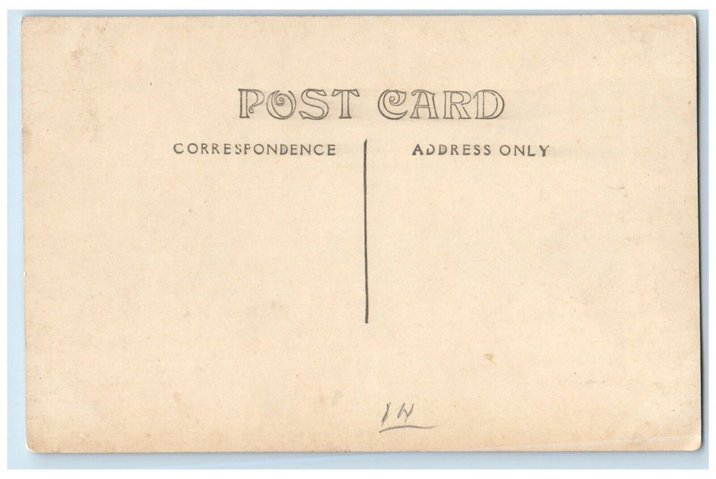 c1910 Horse Wagon Flag Candies Restaurant Casks Dirt Road RPPC Photo Postcard