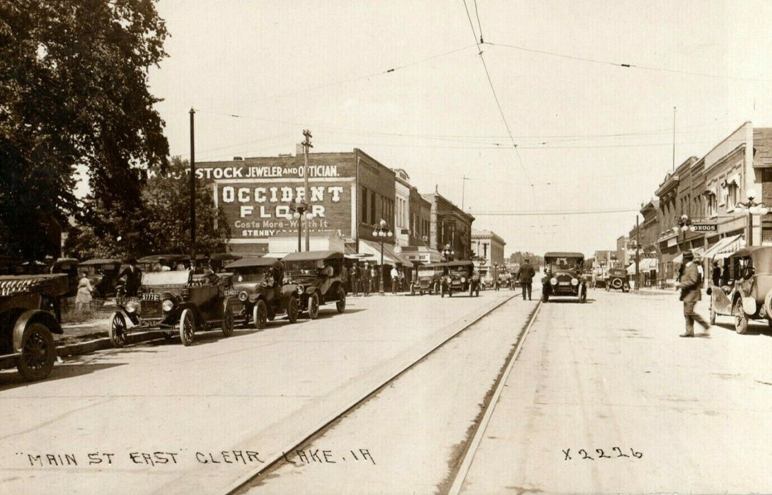 c1920's Clear Lake Iowa IA Main St. East Classic Car License RPPC Photo Postcard