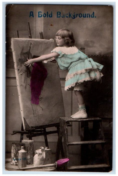 1909 Little Girl Standing Chair Painting A Bold Background RPPC Photo Postcard
