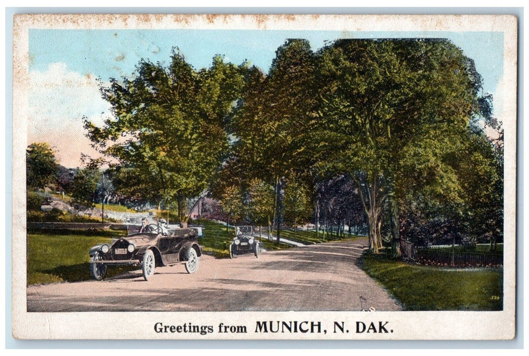 1929 Greetings From Classic Cars Street Road Trees Munich North Dakota Postcard