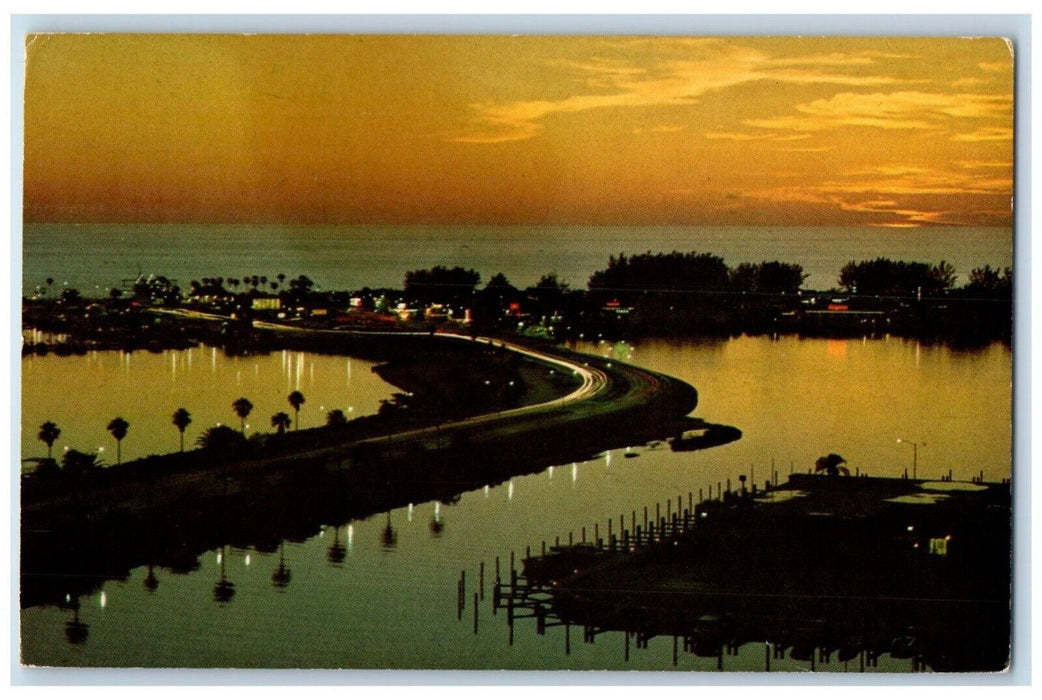 c1950's Clearwater Beach Twilight Florida FL, Memorial Causeway Curving Postcard