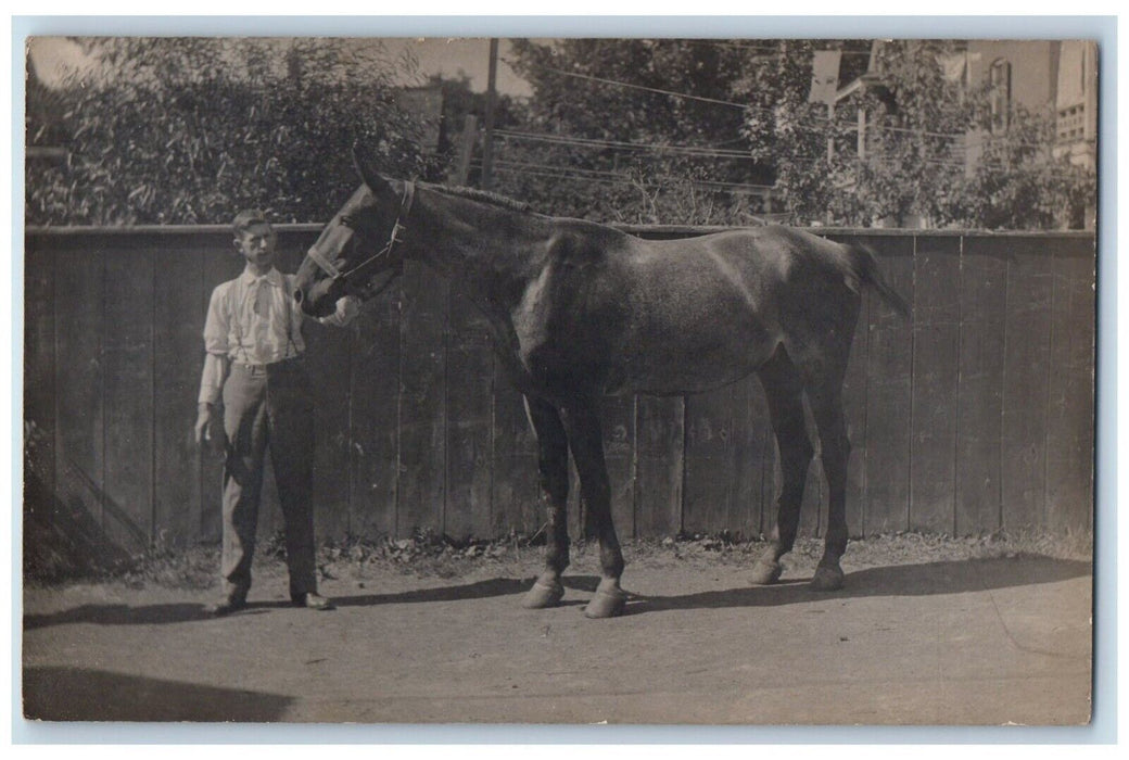 Cowboy And Horse Dirt Road Scene Hartford Livery Antique RPPC Photo Postcard