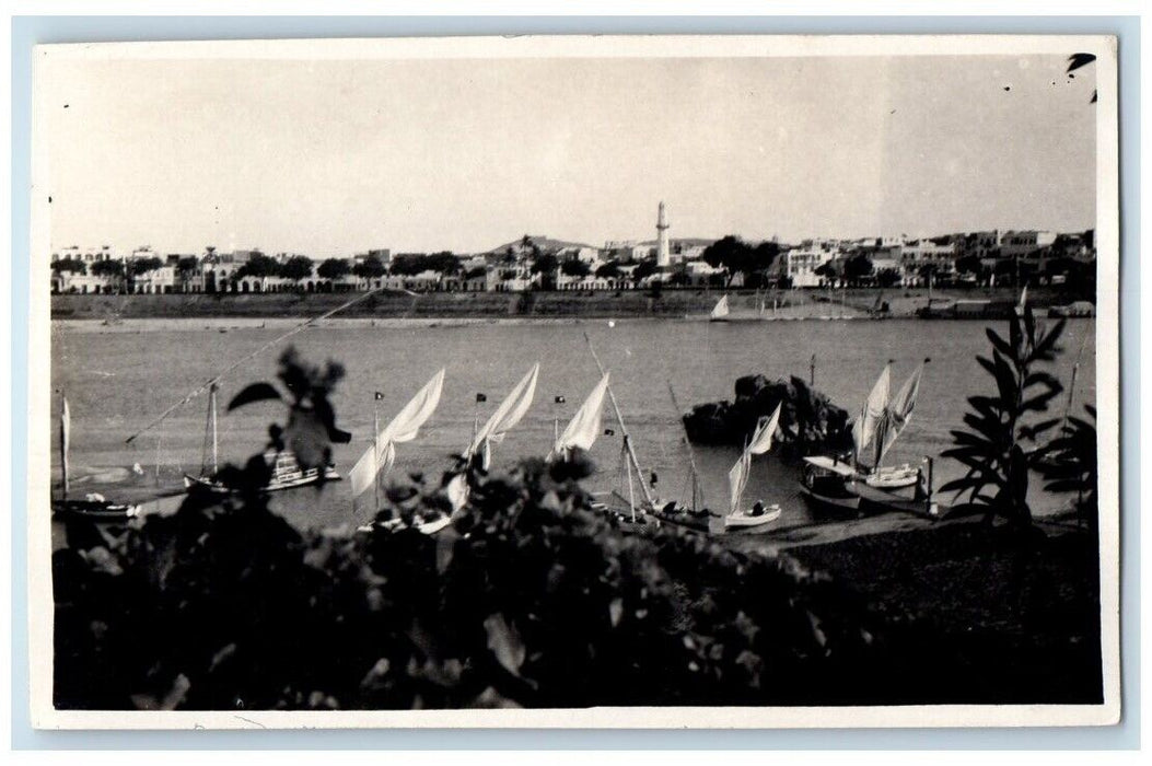 c1920's Nile River Boat Lighthouse City View Assouan Egypt RPPC Postcard