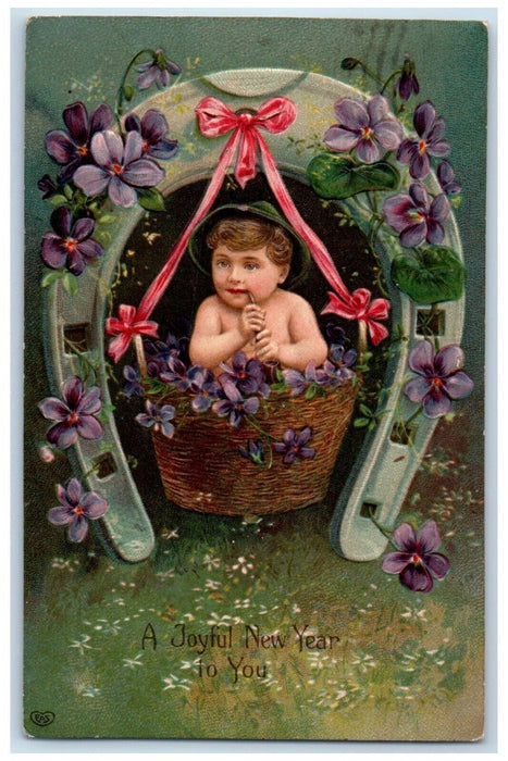 1908 New Year Little Boy In Basket Flowers Horseshoe Embossed Antique Postcard