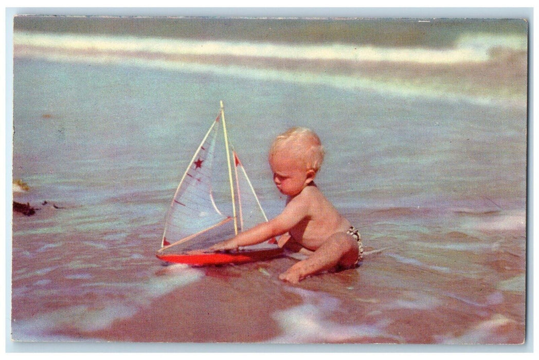 Greetings From Paw Paw Michigan MI Little Kid On The Beach Playing Boat Postcard