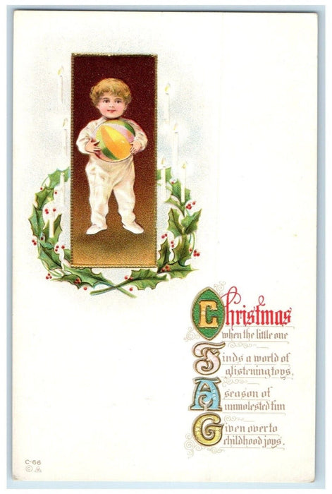 c1910s Christmas Little Boy Holding Ball Holly Berries Embossed Antique Postcard