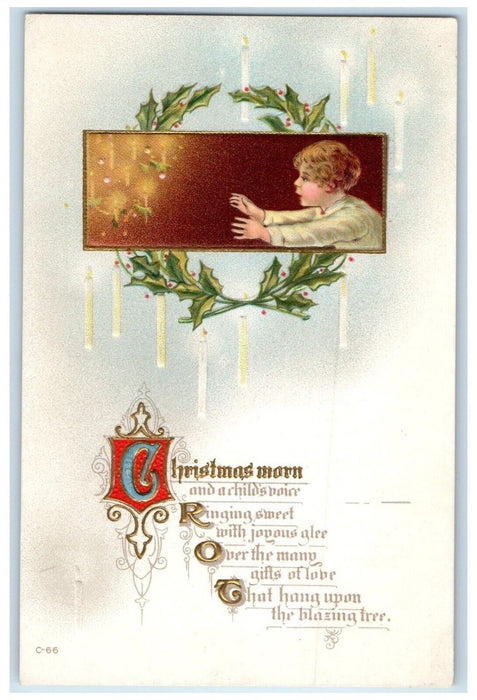 c1910's Christmas Morn Little Boy Candle Lights Holly Berries Embossed Postcard