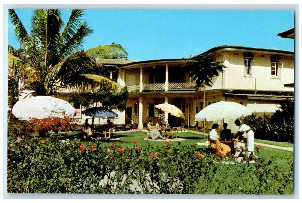 c1950's Table with Umbrellas at Nadi Hotel India Vintage Unposted Postcard