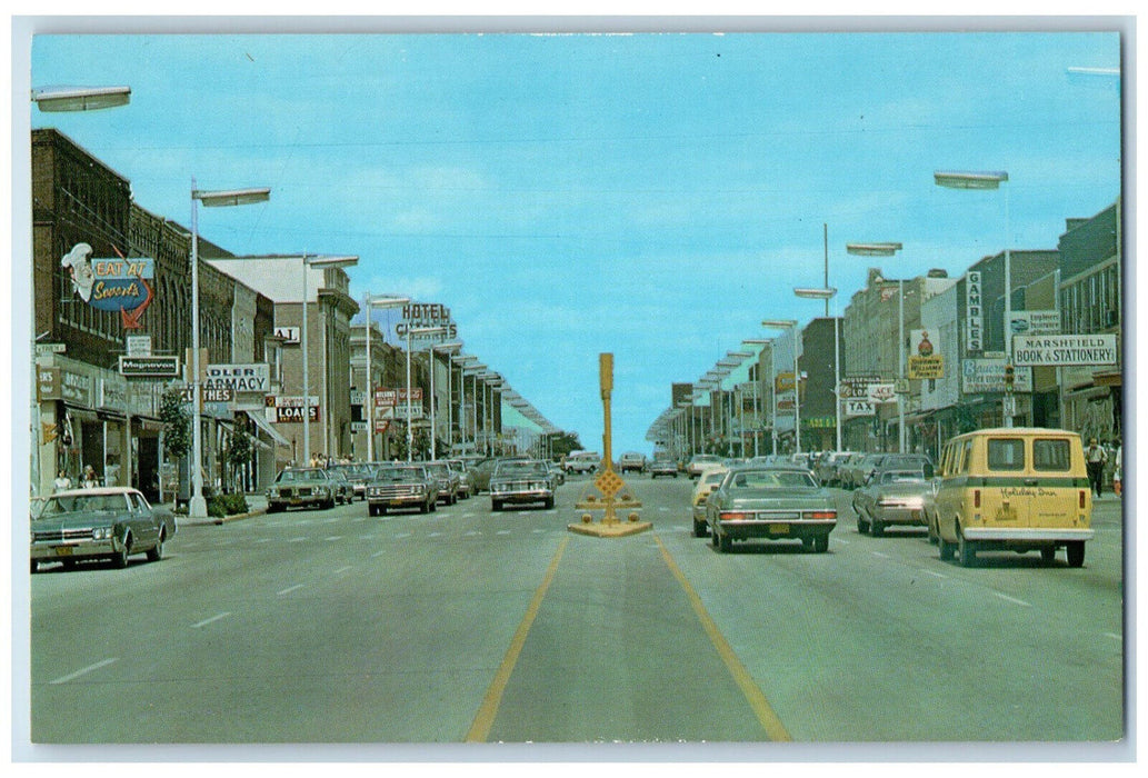c1950's Cars, Hotel, Restaurant, Pharmacy, Book Store Marshfield WI Postcard