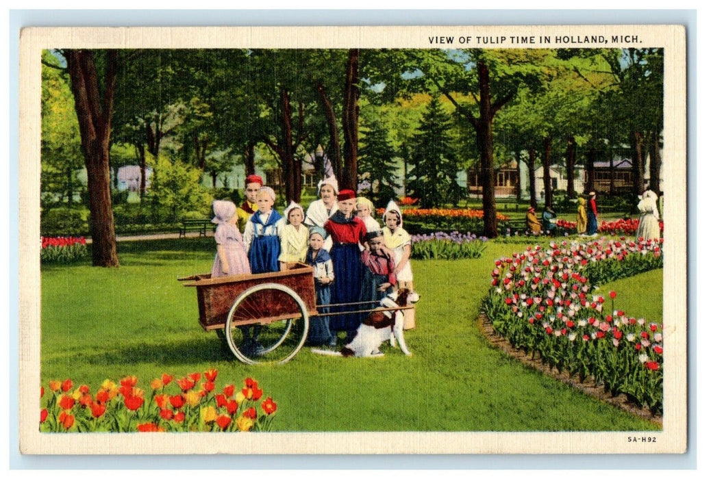 c1930's View Of Tulip Time In Holland Michigan MI Childrens In Cart Dog Postcard