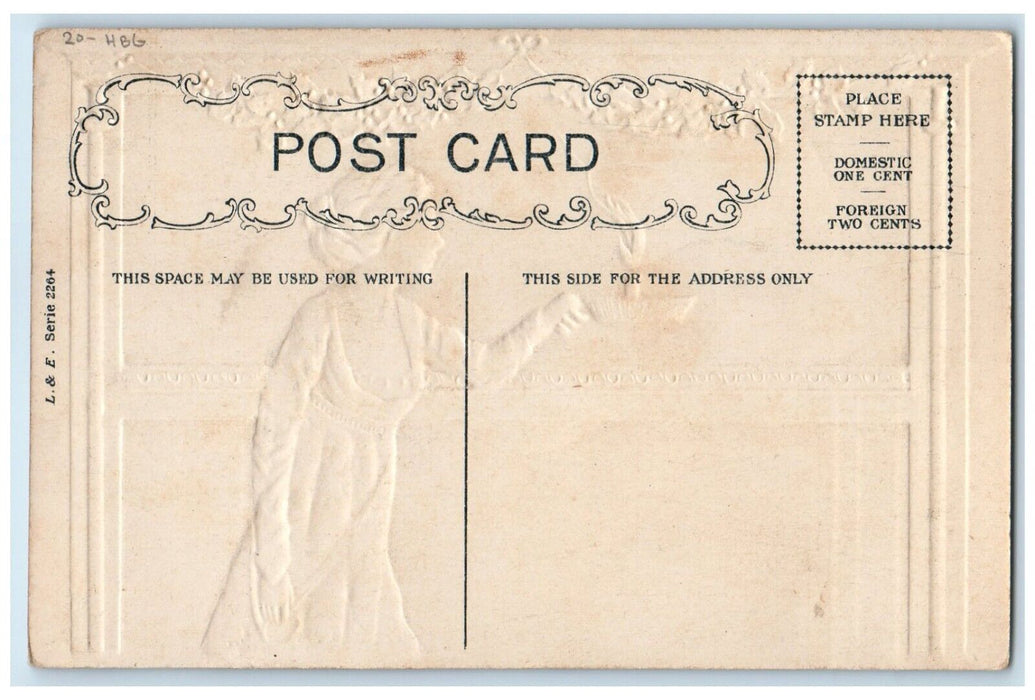 c1910s Christmas Woman Holding Candle Lights Holly Berries HBG Embossed Postcard