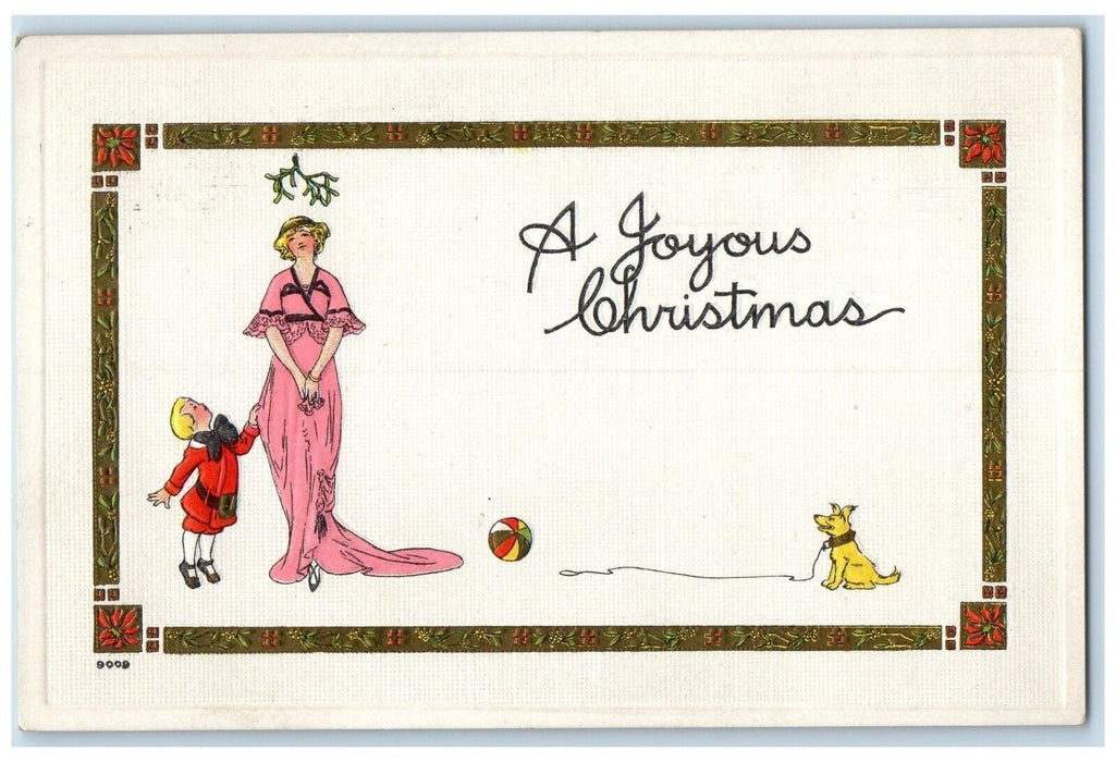 1915 Christmas Mother And Child Under Mistletoe Ball Dog Nunica MI Postcard