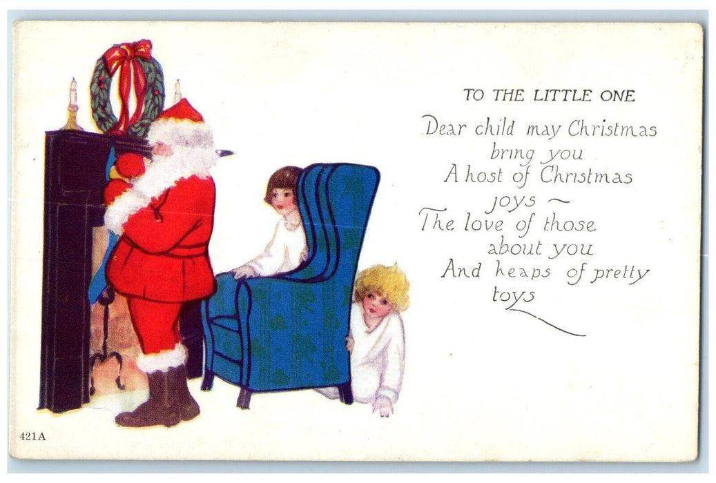 c1910's Christmas Santa Claus Putting Toys In Stockings Fireplace Postcard