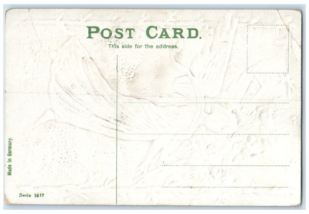 c1910's Christmas Tree Decorated Holding Angel Embossed Antique Postcard