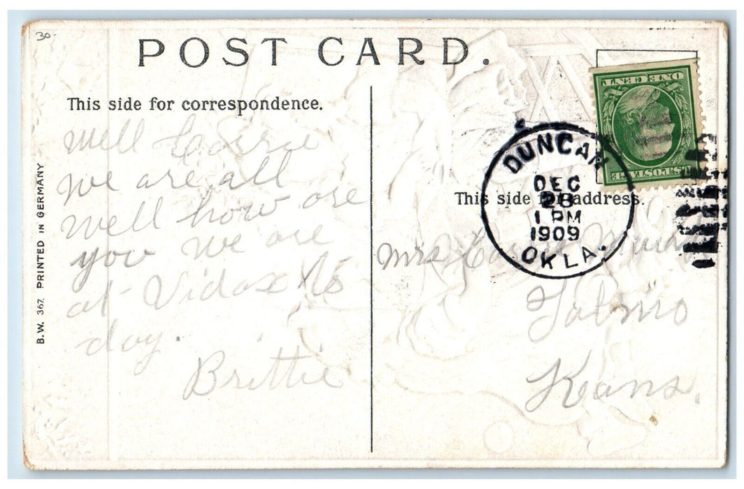 1909 Christmas Two Girls Checking Book Paper Holly Doll Embossed Postcard