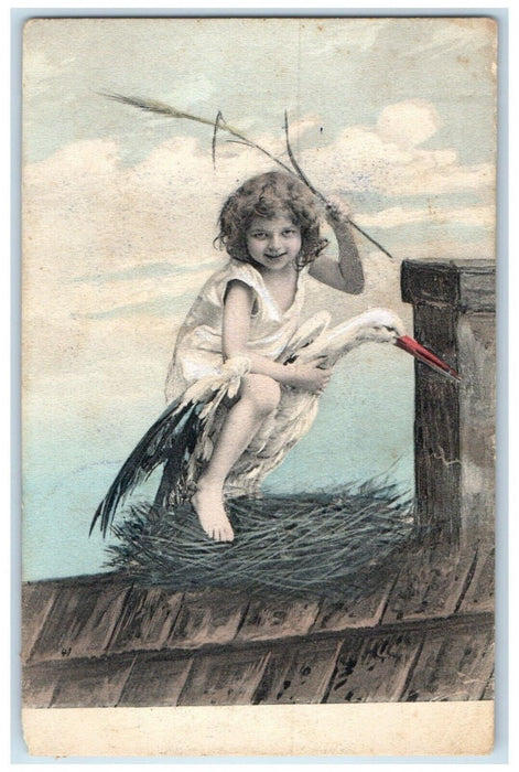 1909 Little Girl Riding Stork On Top Of Roof Middletown MD Antique Postcard