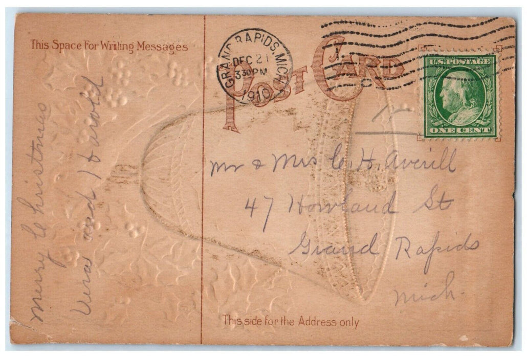 1910 Christmas Ringing Bells Holly Berries Embossed Grand Rapids MI Postcard