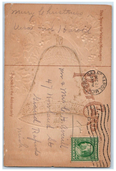 1910 Christmas Ringing Bells Holly Berries Embossed Grand Rapids MI Postcard