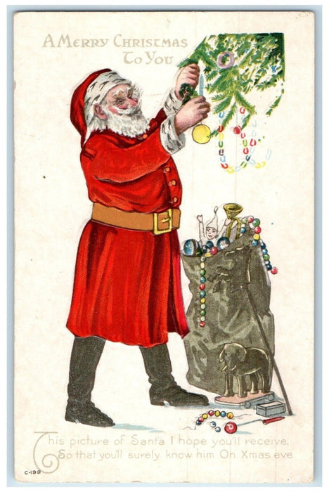 c1910's Merry Christmas Santa Claus Sack Of Toys Embossed Antique Postcard