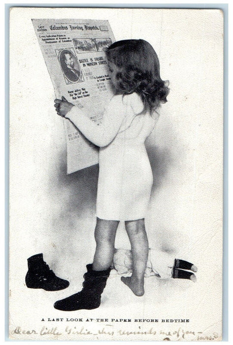Little Girl A Last Look At The Paper Before Bedtime Doll Columbus OH Postcard