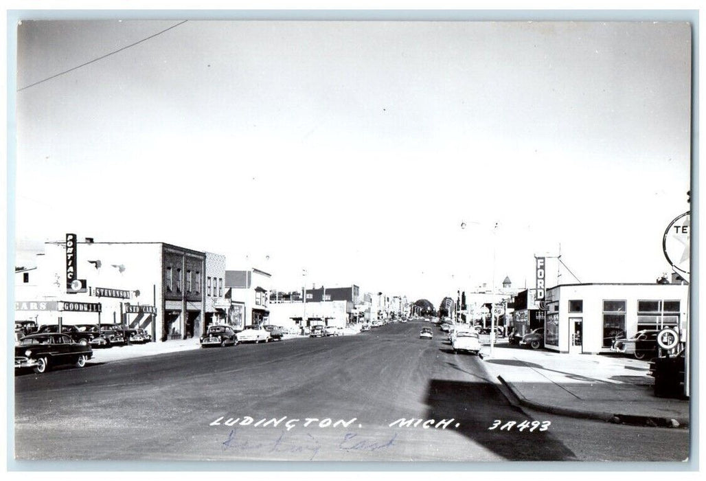 c1950's Ford Pontiac Car Dealership Street View Ludington MI RPPC Photo Postcard