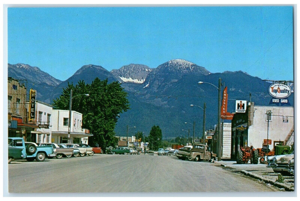 c1960's Main Street View Mission Mountains Cars Ronan Montana MT Postcard