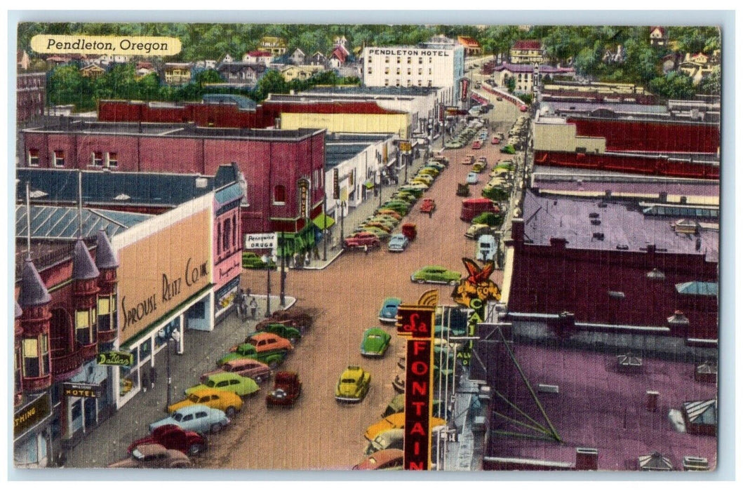 1963 Main Street View Drugs Store Hotel Cars Pendleton Oregon OR Posted Postcard