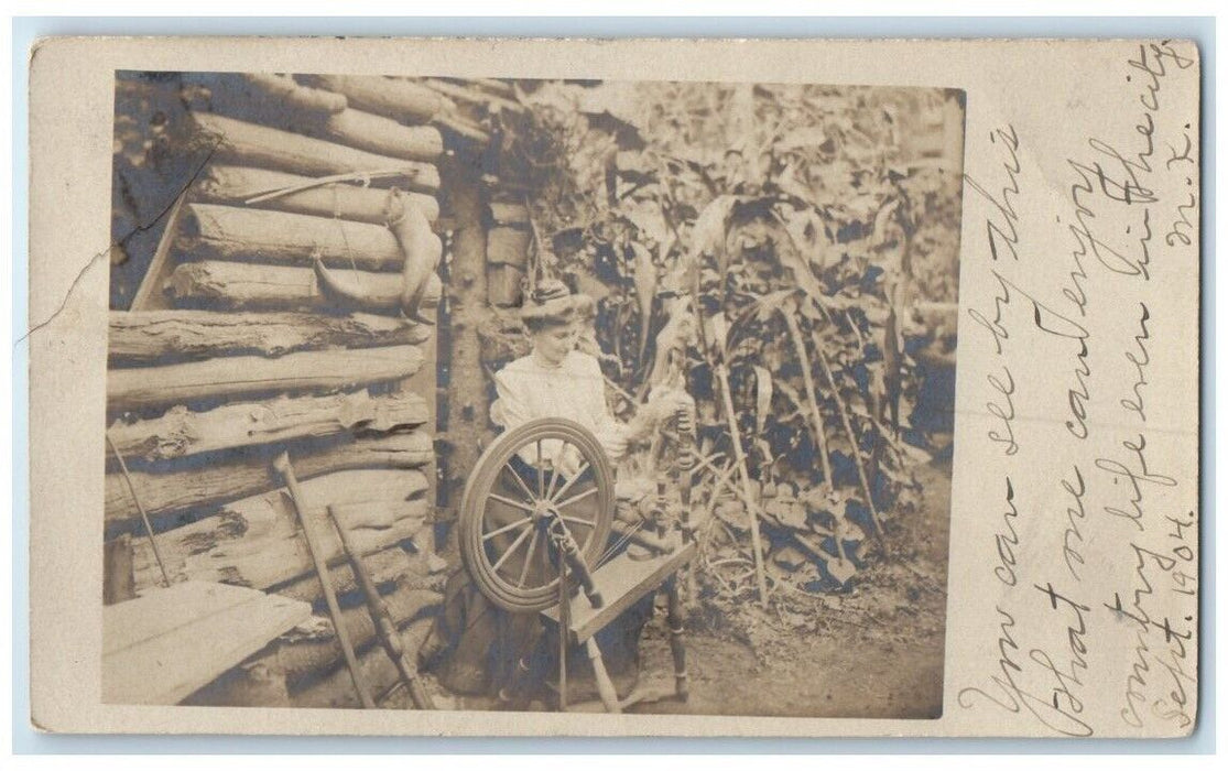 1904 Spinning Wheel Woman Log Cabin View New York NY RPPC Photo Postcard