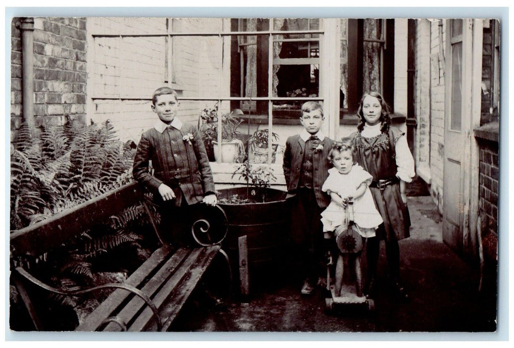 c1910's Children Siblings House England United Kingdom RPPC Photo Postcard