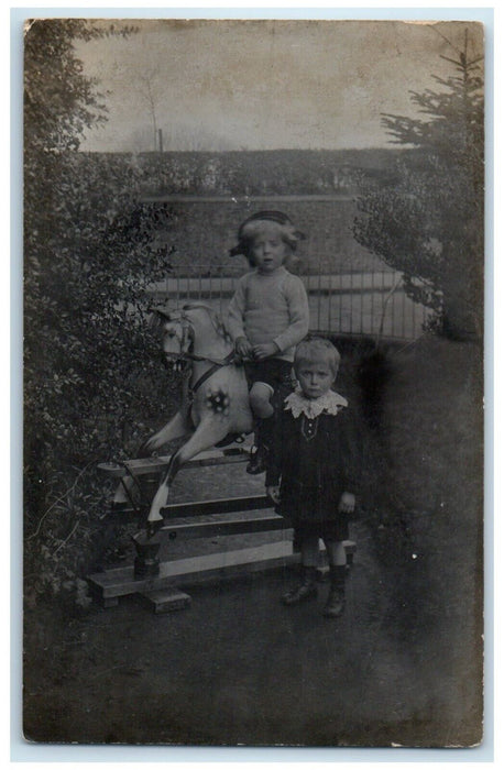 c1910's Little Kids Toy Rocking Horse England UK RPPC Photo Antique Postcard