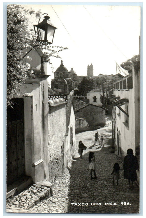 1961  Kids and Adults in Street Scene Taxco Guerrero Mexico RPPC Photo Postcard