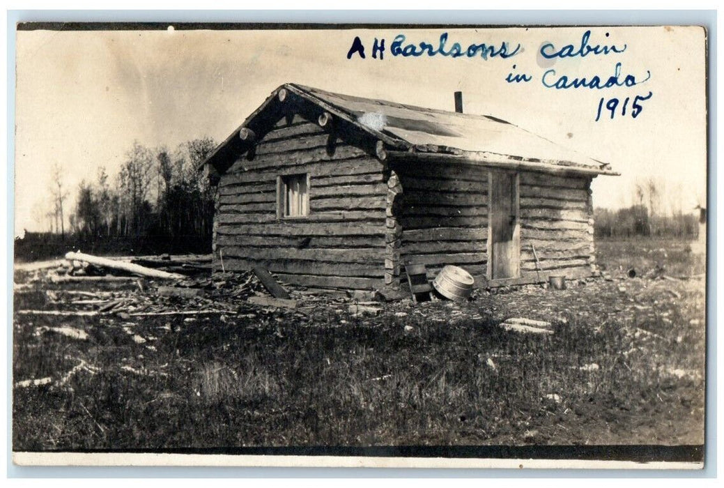 1915 A.H. Carlson's Log Cabin Home View Canada RPPC Photo Posted Postcard