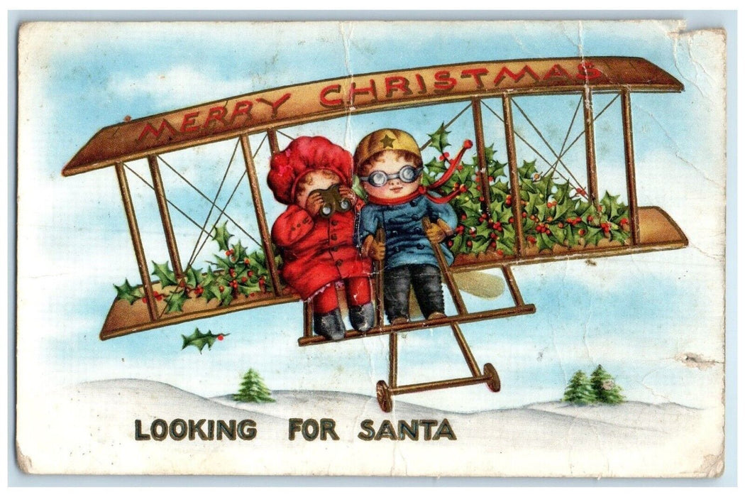 c1910's Christmas Children Airplane Looking For Santa Holly Berries Postcard