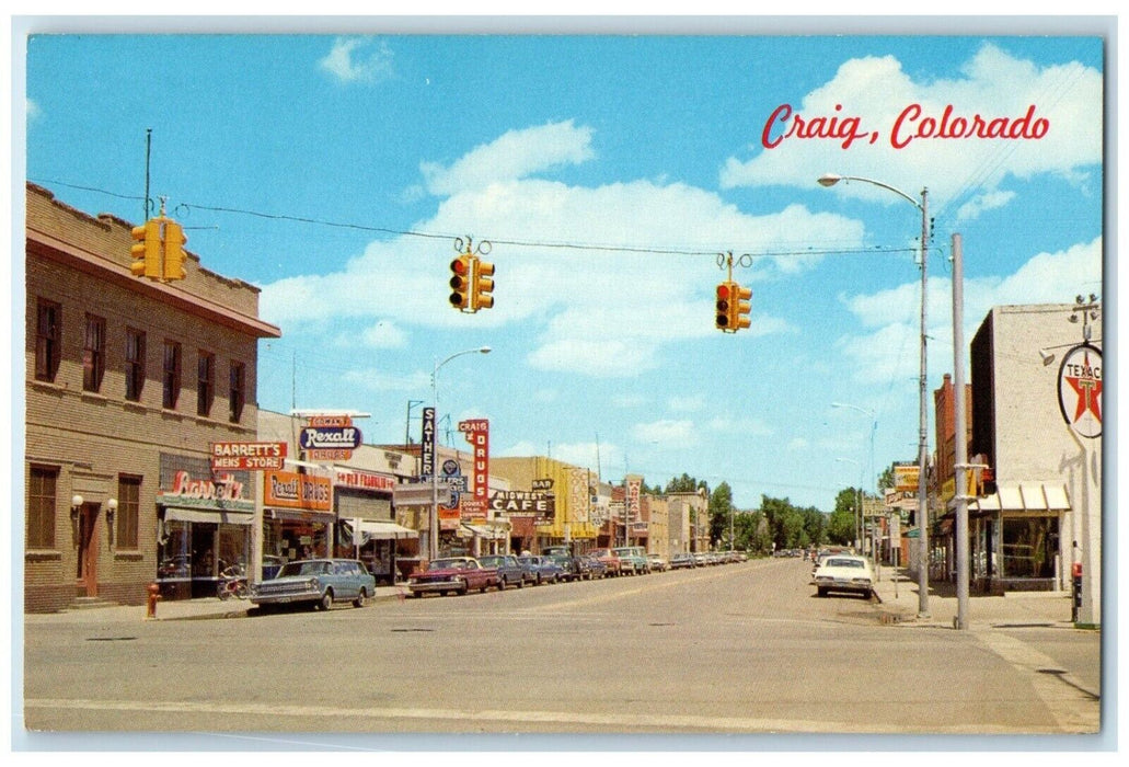 Craig CO, Main Street Business Section Drug Store Texas Gas Station Postcard