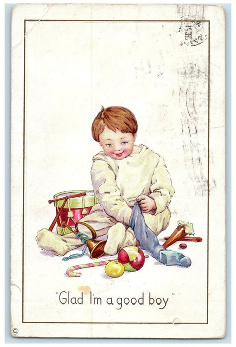 c1910's Boy Putting Toys In Stocking Embossed Ballstonspa New York NY Postcard