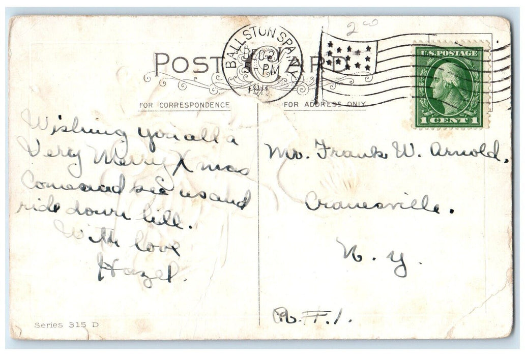 c1910's Boy Putting Toys In Stocking Embossed Ballstonspa New York NY Postcard