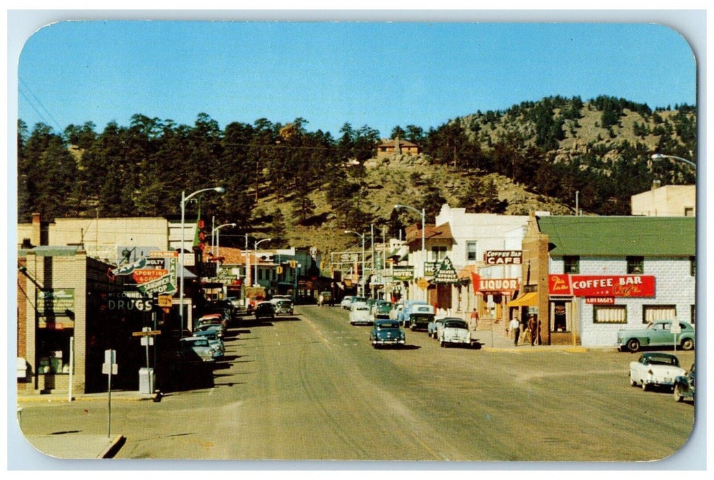 Elkhorn Avenue And Business District Cars Drugs Store Estes Park CO Postcard